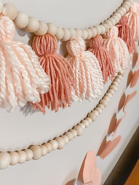 Valentines Diy Garland, Yarn Heart Garland, Subtle Pink Decor, Whimsical Valentines Decor, Valentine Tassels, Valentine’s Decorations For Home, Valentines Day Garland Diy, Diy Valentine Garland, Valentine’s Day Garland