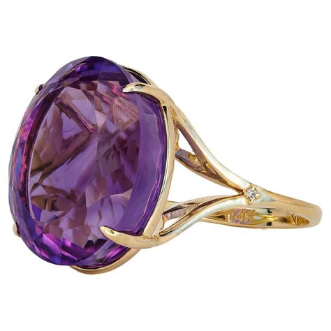 14 kt solid gold ring with natural amethyst and diamonds. February birthstone. Weight: 6.50 g. Central stone: Natural amethyst Weight: approx 14.00 ct. Color: violet, oval cut. Clarity: Transparent with inclusions. Surrounding stone: Diamonds: 2 pieces, weight - 0.02 ct (0.01 ct x 2 pieces), F/VS, round brilliant cut. Cathedral Ring Setting, Heart Halo Ring, K Ring, Amethyst Cocktail Ring, Sapphire Cocktail Ring, Amethyst And Diamond Ring, Color Violet, Gold Cocktail Ring, Solid Gold Ring