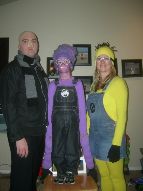 Gru, Purple and yellow Minion Grew And Minions Costume, Minions And Gru Halloween Costume, Gru Vector Minion Costume, Purple Minion Outfit, Gru Minion Costume, Vector And Gru Halloween Costume, Gru And Minion Costume, Gru And Vector Costumes, Halloween 3 People Costumes