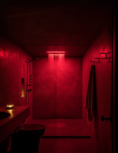 Stained plywood box houses kitchen and bedroom in renovated Seattle condo Red Light Bathroom, Red Light Room, Dark Plywood, Red Lights Bedroom, Secret Rendezvous, Stained Plywood, Red Bath, Houses Kitchen, Sliding Wood Doors