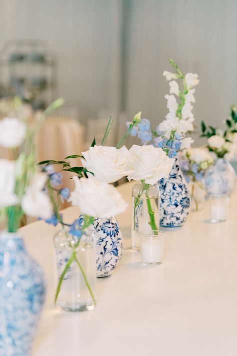 Classic Southern White and Blue Wedding Reception with Chinoiserie China Vases and Simple White Floral Centerpieces Wedding Table Decorations Blue And White, Blue And White Wedding Theme Receptions, Wedding Cocktail Hour Table Decor, Centerpieces Blue And White, Wooden Table Decorations Wedding, Vase Wedding Decor, White And Blue Engagement Party, White And Blue Wedding Reception, Blue And White Christmas Wedding