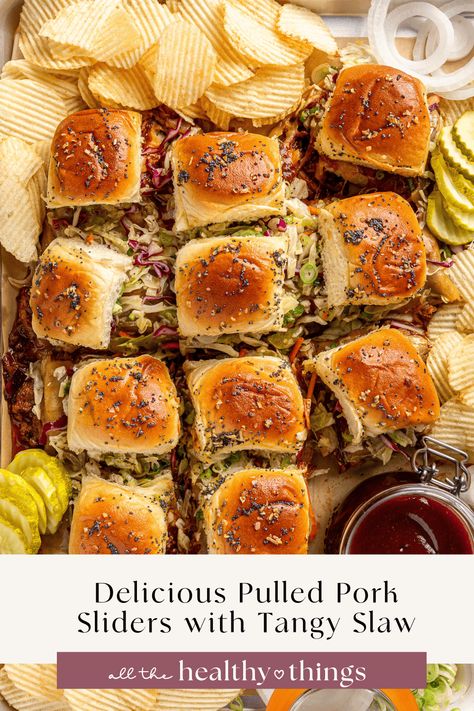 These delicious Pulled Pork Sliders are made with saucy BBQ pulled pork, melty smoked Gouda cheese, and a tangy coleslaw on toasted sweet Hawaiian rolls. These sliders are so easy to make and perfect for everything from game days to a fun weeknight meals! Pork Sliders Recipes, Coleslaw For Pulled Pork, Tangy Coleslaw, Sweet Hawaiian Rolls, Sliders Recipes Hawaiian Rolls, Bbq Sliders, Bbq Pork Sandwiches, Slow Cooker Baked Beans, Slow Cooked Pulled Pork