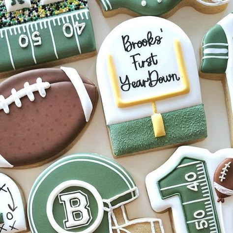 Copper State Cookie Co. on Instagram: "Brooks’ First (year) Down 🏈🏈🏈 thank you @mrs.kshep for always giving me creative freedom!! • • • #sugarcookies #arizonacookies #royalicingcookies #cookieart #sugarcookiedecorating #decoratedsugarcookies #arizonacookier #edibleart #sugarcookiesofinstagram #copperstatecookieco #shoplocal #shopgilbert #supportlocal #gilbertsmallbusiness #gilbertcookies #gilbertmoms #mesamoms #chandlermoms #firstdownbirthday #firstyeardowncookies #birthdaycookies #nflcookies #footballcookies #jerseycookies #firstbirthdaycookies" Football Themed Cookies Decorated, Football Birthday Party Cookies, Football Jersey Cookies Decorated, Football Team Cookies, Football Decorated Sugar Cookies, Football Helmet Cookies Decorated, Football Birthday Cookies Decorated, First Year Down Cookies, Football Jersey Cookies