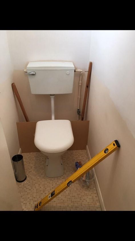 Woman upgrades toilet for just £100 and here's how | LatestDeals.co.uk Cloakroom Toilet Downstairs Loo, Small Toilet Decor, Toilet Remodel, Diy Kast, Small Toilet Design, Toilet Closet, Hidden Toilet, Small Downstairs Toilet, Cloakroom Toilet