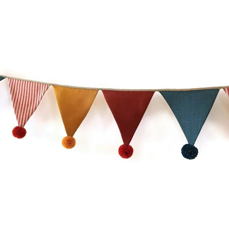 A custom made vintage circus themes inspired linen bunting garland for nursery, kids room or your celebration. Bunting banners are from 4 different linen colors (yellow, blue, red, white-red striped). Optional: with / without hand made alpaca yarn pom pom. COMPOSITION - linen - linen twine - additional: alpaca yarn pom poms. SIZE Each flag is ~13 x 13 cm (~5,11 x 5,11 inch). in 100 cm - 7 units in 200 cm - 14 units, etc. Circus Baby Room, Vintage Circus Nursery, Carnival Nursery, Vintage Circus Theme, Yarn Pom Poms, Vintage Kids Room, Felt Bunting, Baby Shower Bunting, Circus Decorations