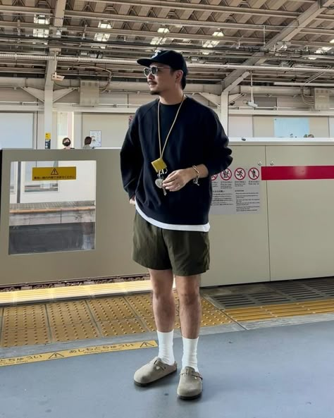 man wearing sweatshirt, shorts, and birkenstock clogs Clogs Outfit Men, Men Birkenstock Outfit, Mens Birkenstocks Outfit, Birkenstock Boston Outfit Men, Birkenstock Boston Clog Outfit, Birkenstock Outfit Men, Boston Clogs Outfit, Clog Outfits, Birkenstock Clog Outfit