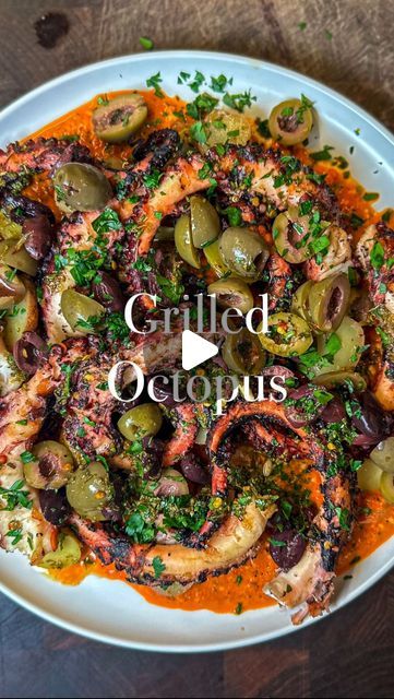 Rocco Gizzo on Instagram: "Fork Tender Grilled Octopus | I’m not lying when I say this octopus is fork tender… if you don’t believe me, watch the video to find out!  🐙Octopus🐙 -1 Whole Octopus (2-3lbs)  -Parsley Stems -1 lemon -Small palmful black pepper  🫒Vinaigrette🫒 -2tbsp EVOO -1/2 lemon, juiced -1 tbsp oregano  -1/4 tsp red pepper flakes  -Splash red wine vinegar  -Parsley -Salt  🫑 Romesco 🫑 -1 jar roasted red peppers -Handful fresh parsley  -1/4 cup cherry peppers -1/4 cup almonds, toasted -2 garlic cloves, smashed -2 tbsp red wine vinegar -1 tsp smoked paprika  -1/4 tsp red pepper flakes, -Salt, to taste -1/4 to 1/3 cup EVOO  Add all the romesco ingredients to a blender, and blend until emulsified. Then set aside in the fridge.   Remove the beak and eyes from the octopus and r Grilled Octopus Salad, Grilled Octopus Recipe Greek, Baked Octopus Recipes, Octopus Recipes Grilled, Octopus Appetizer, Italian Octopus, Octopus Dishes, Grilled Octopus Recipe, Roasted Octopus