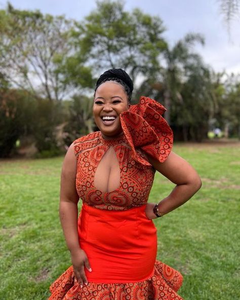 Orange Traditional Outfits, Orange Shweshwe Dresses, Orange Traditional Dresses, Lobola Outfits Bridesmaids, Shweshwe Dresses South Africa, Tsonga Dresses, Shweshwe Dresses Patterns, Lobola Outfits, Seshweshwe Dresses