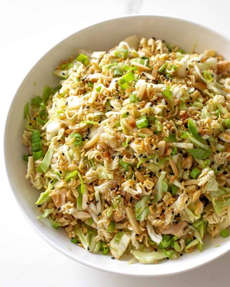 This Ramen Noodle Salad is a crunchy salad filled with rotisserie chicken, green cabbage, sliced almonds, sesame seeds, crunchy Ramen noodles, and green onions. #ramen #noodle #salad #recipe Ramen Chicken Salad, Ramen Cabbage Salad, Best Ramen Noodles, Pork Soup Recipes, Ramen Chicken, Ramen Salad, Ramen Noodle Salad, The Girl Who Ate Everything, Cabbage Salad Recipes