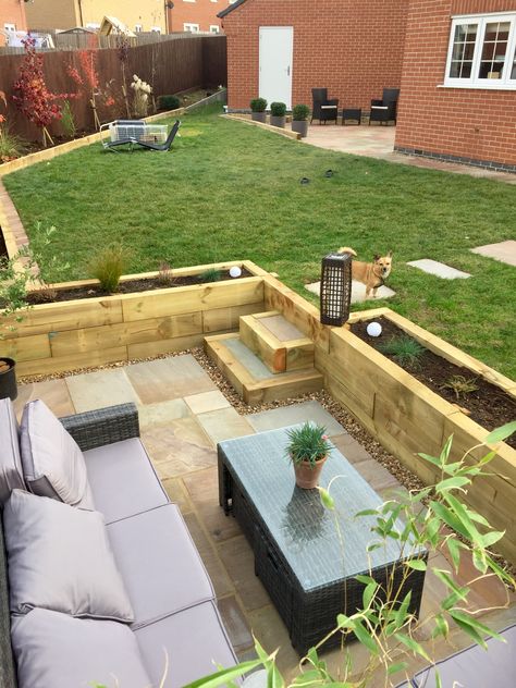 Sunken Patio, Railway Sleepers, Indian Sandstone Paving. Larissa James Landscaping Backyard Sunken Seating, Sloped Garden Seating Area, Sunken Garden Ideas Seating Areas, Sunken Area In Garden, Indian Sandstone Patio With Sleepers, Sloped Garden Patio Ideas, Patio And Sleepers, Sunken Patio Ideas Retaining Walls, Sunken Backyard Patio