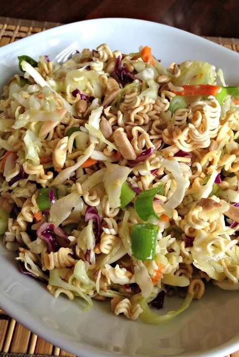 Looking for salad recipes? Try making this ramen salad. Use roman noodles, cabbage, almonds, and sunflower seeds to make this quick and easy ramen salad for a side dish, side salad, lunch, or dinner. #saladideas #saladrecipes #salads #vegetables #sidedishrecipes #sides #dinnersidedish #sidedishes #sidedishideas Ramen Cabbage Salad, Crunchy Noodle Salad, Best Ramen Noodles, Ramen Salad, Ramen Noodle Salad, Ramen Dishes, Top Ramen, Noodle Salad Recipes, Ramen Noodle Recipes