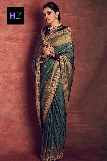 Recreate Deepika Padukone's Look In Green Sabyasachi Saree For Your BFF's Reception Royal Saree Look For Wedding, Royal Saree Look, Deepika Padukone Saree, Green Sari, Sabyasachi Sarees, Indian Sari Dress, Saree Draping Styles, Deepika Padukone Style, Outfit Essentials