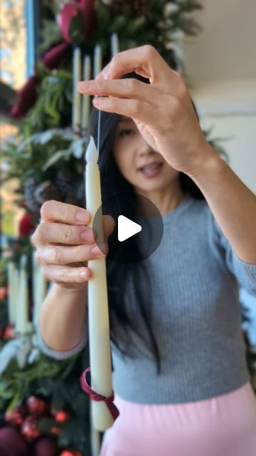 Chelsea on Instagram: "A tutorial on how I hang the candles on the tree. I tied a fishing line on the "flame" part of the candle, then hang it like an ornament on the tree branch. My tips for decorating a tree like this is to bundle 5-7 candles together and only use the candles as lights on the tree. It will give the candles all the spot lights when lit. #decoratewithme #christmasdecor #christmasideas #christmastree #christmasdiy #candlechristmastree" Hanging Taper Candles, Taper Candles Christmas Tree, Natural Table Garland, Floating Candles Christmas Tree, Christmas Tree Candle Lights, Candle Stick Decor Ideas For Christmas, Candles For Christmas Tree, Candle On Christmas Tree, Christmas Tree Taper Candles