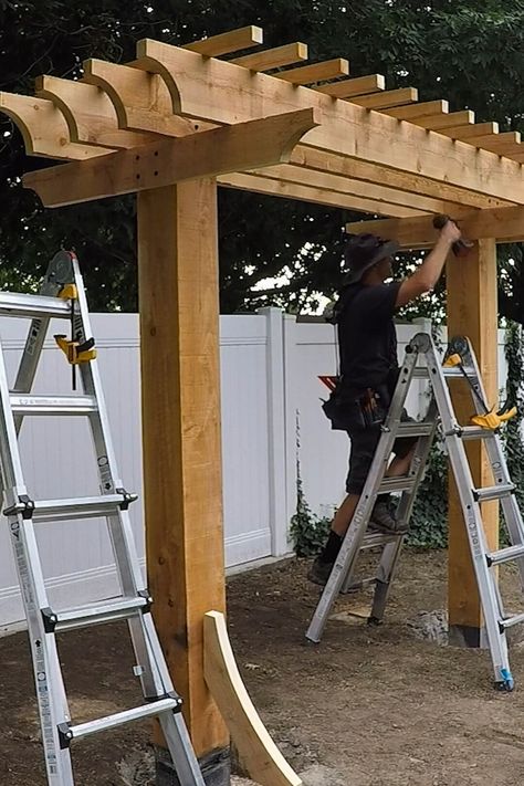 DIY Arbor Swing: Lattice Purlins & Beam Supports (Part 2) | Remodelaholic Arbor Plans How To Build, Single Post Pergola, Arbor Ideas Climbing Vines, How To Build A Grape Arbor, Fence Arbor Ideas, Small Yard Pergola Ideas, Wood Arbor With Gate, Deck With Arbor, Simple Arbor Ideas