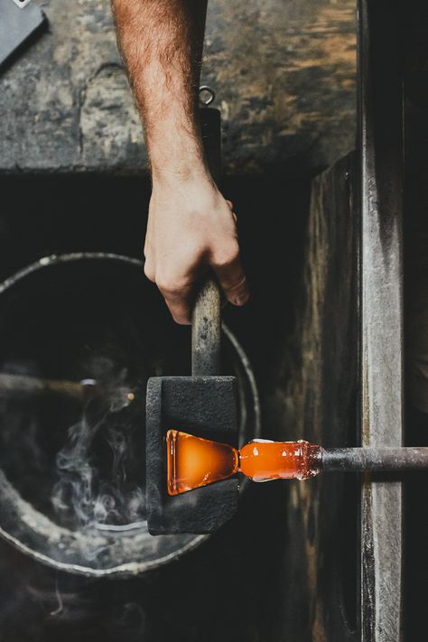 Molding  A cherry wood mold is used to shape  the base of the glass. The mold is made in-house,  as are all the factory’s tools. Glass Blowing Aesthetic, Tools Photo, Book Cover Background, Glassblowing Studio, Country Photography, Raw Art, Mayfly, Arte Alien, Blown Glass Art