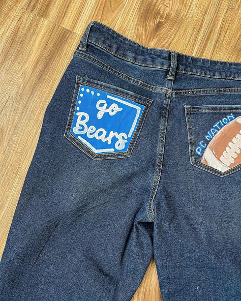 Looking for painted jeans? I am now doing customizable jeans!🩵🫶🏼🤪 #jeans #paintedjeans #art #paint #seniorjeans #smallbusiness Homecoming Painted Jeans Ideas Diy, Painted Jeans For Football Games, School Jeans Painted, Homecoming Painted Jeans, Hoco Painted Jeans, Spirt Jeans, Homecoming Jeans Painted, Painted Jeans School Spirit, Hoco Jeans Painted