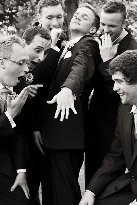 Ring admiration!!!! Groom And Friends Photo Ideas, Groomsmen Throwing Groom, Groomsmen Walk Up Photos, Bridal Party Group Photos, Groomsmen Getting Ready Pictures, Wedding Group Poses, Wedding Photos Groomsmen, Funny Groomsmen Photos, Funny Wedding Poses