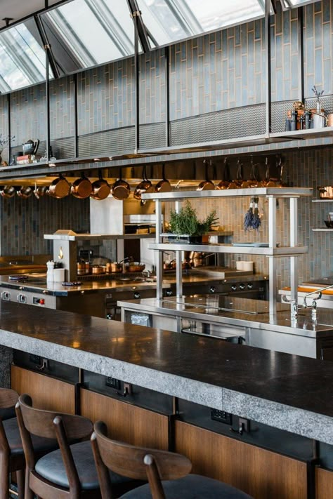 an open kitchen with a counter lined with stools Open Kitchen Bar Design, Open Kitchen Design Restaurant, Open Kitchen Bar, Kitchen Restaurant Design, Open Kitchen Restaurant, Open Kitchen Design, Commercial Kitchen Design, Open Restaurant, Restaurant Kitchen Design