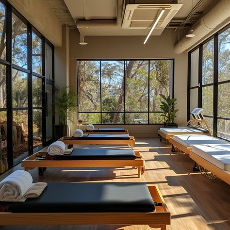 Serene Pilates Studio: A tranquil Pilates studio bathed in sunlight with modern equipment and a view of nature. #pilates #studio #serene #tranquil #sunlight #equipment #reformer #modern #aiart #aiphoto #stockcake https://ayr.app/l/VWQy Pilates Retreat, Best Pilates Studio Design, Reformer Pilates Studio Design Interiors, Outdoor Pilates Studio, Reformer Pilates Home Studio Design, Pilates Reformer Studio, Aerial Yoga Studio Design, Pilates Yoga Studio, Eco Garden