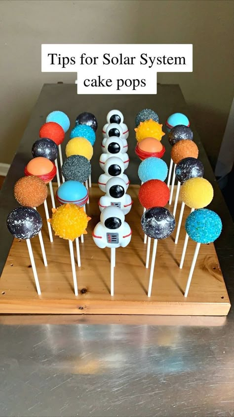 Planets Cake Pops, Space Cake Pops Solar System, Galaxy Birthday Party Activities, 1st Trip Around The Sun Cake Pops, Astronauts Birthday Party Ideas, Planets Birthday Theme, Solar System Cake Pops, Astronaut Dessert Table, Cake Pop Planets