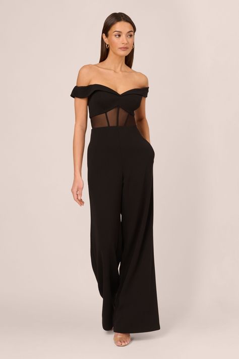 Go boldly to your next event in this sexy jumpsuit. This jumpsuit features an off the shoulder bodice with sweetheart neckline, wide-leg trousers, and a sheer panel at the waist with boning construction for a corset effect. Crafted from knit crepe fabric, this eye-catching jumpsuit has some stretch. A stunning choice for every formal or black-tie affair, this off the shoulder jumpsuit is easy to style with your favourite neutral heels and simple metallic jewels. A zipper closure at the centre ba Corset Jumpsuit, Off The Shoulder Jumpsuit, Black Jumpsuits, Sheer Corset, Evening Style, Neutral Heels, Evening Jumpsuit, Black Bridal, Black Tie Affair