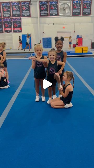 Megan on Instagram: "It was a tiny day 💙" Small Team Cheer Pyramid, Flag Cheer Stunts, Tiny Mite Cheer Stunts, Level 1 Pyramid Cheer, 3 Person Cheer Stunts Easy, Cheer Extension Stunt, Pee Wee Cheer Stunts, Mini Cheer Stunts, Teddy Bear Cheer Stunt