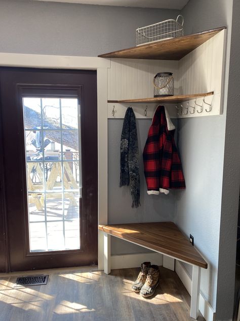 My brother built this custom corner shoe/coat storage center with solid walnut shelves, a bead board back and plenty of hooks.  It effectively utilized an awkward corner that was too small for anything useful. Corner Shoe Storage Entryway, Corner Shoe And Coat Storage, Small Hall Coat Storage, Small Entrance With Storage, Kitchen Coat Storage, Corner Shelves Entryway Small Entry, Corner Shoe Storage Ideas, Corner Storage Hallway, Shoe And Coat Storage Small Space