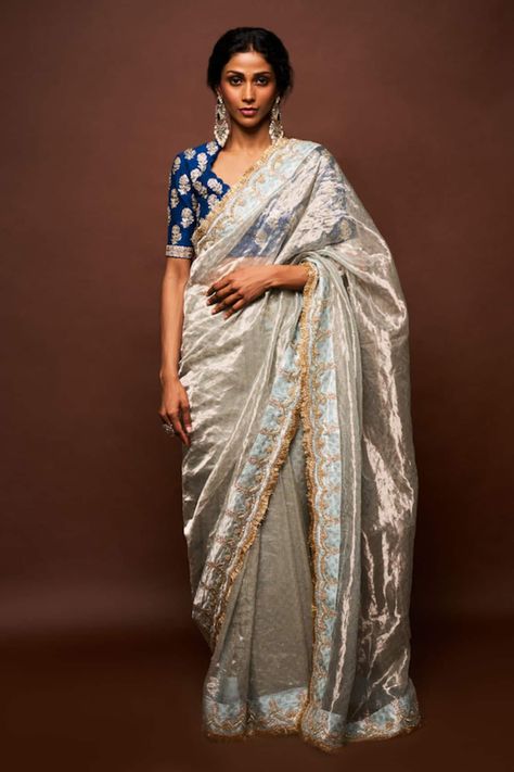 Buy Grey Tissue Embroidered Cutwork Scallop Trishi Border Saree With Blouse For Women by ISSA STUDIO BY CHETANA & SWATHI Online at Aza Fashions. Contrast Blouse And Saree Combinations, Golden Saree With Blue Blouse, Blouse With Grey Saree, Grey Saree Contrast Blouse, Blue Colour Saree With Contrast Blouse, Contrast Blouses For Silk Sarees, Grey Saree Blouse Combination, Golden Saree With Contrast Blouse, Chikankari Saree Blouse