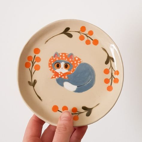 cloudy 🐈shop update: March 16th🌼 on X: "Still in my babushcat era 🐱🧓🌷 https://t.co/M4jRq6iVUy" / X Cat Ceramic Plate, Cat Plate Ceramic, Cat Plates Pottery, Hand Painted Plates Ideas, Cat Ceramic Ideas, Cat Pottery Painting, Hand Painted Pottery Plates, Ceramic Plate Painting Ideas, Plate Pottery Painting Ideas