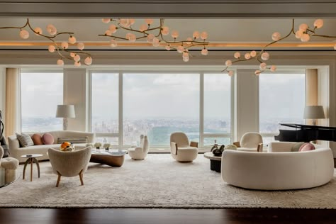 Penthouse Interior, Glass Globe Chandelier, Lacquered Walls, Condo Living Room, Metal Light Fixture, Globe Chandelier, Glass Globes, Condo Living, Interior Design Magazine