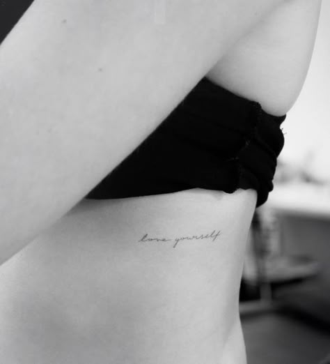 Love Yourself Tatuaje, Tattoo Side Rib Women, Tattoo Side Rib, Side Rib Tattoos Women, Tattoo Ribcage, Brave Tattoo, Rib Tattoo Quotes, Tattoo Rib, Small Rib Tattoos