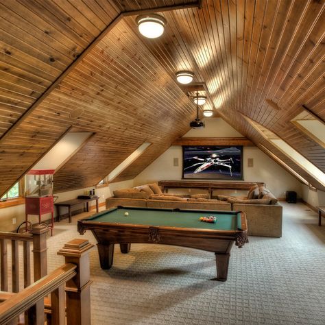 75 Home Theater Ideas You'll Love - August, 2024 | Houzz Attic Game Room, Slanted Roof, Attic Staircase, Cozy Attic, Attic Renovation Ideas, Traditional Family Room, Finished Attic, Attic Bedroom Designs, Attic Flooring