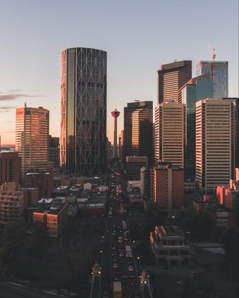 Downtown Calgary looks magical at golden hour. 🌇😍 Calgary Aesthetic, Calgary Downtown, Canada Calgary, Dream Places To Visit, Chestnut Springs Series, Downtown Calgary, Downtown Core, Chestnut Springs, Elsie Silver