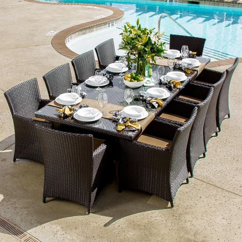 Dine in style with this resin wicker patio dining set by Lakeview. The table expands from 72 to 102 inches and features 3 pieces of tempered glass tops. Browse our numerous collections of patio dining sets and bring the party outside! 10 Person Dining Table, Avery Island, Resin Wicker Patio Furniture, Wicker Dining Set, Outdoor Patio Set, Patio Sofa Set, Wicker Patio Furniture, Extension Table, Patio Dining Table