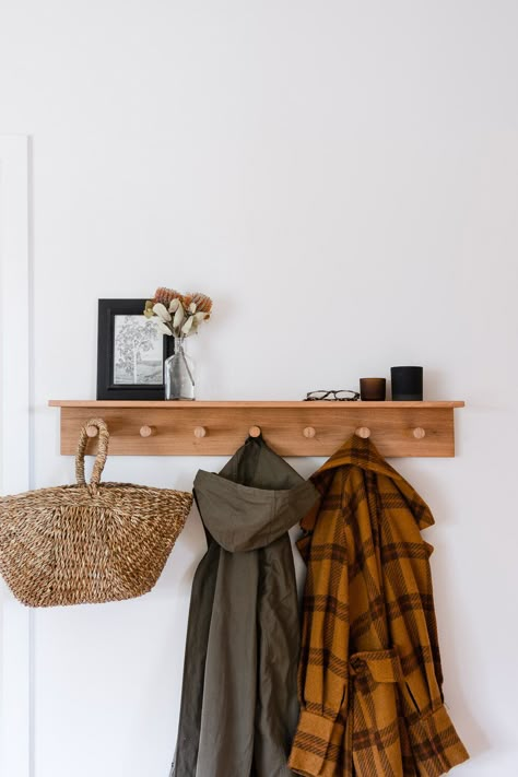 Tiny Entryway Shelf, Wall Shelf Coat Hanger, Coat Rack Living Room, Entry Wall Hanger, Hang Coats Ideas, Boho Coat Rack Wall, Entrance Coat Hanger Ideas, Staircase Organization, Entryway Floating Shelves