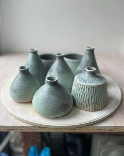 Naomi Critcher Pottery on Instagram: "New bud vases in a Satin Lichen glaze.  I have made many a bud vase in search of a shape and style that best fits with my work. But what I came to realise is that it is more important to find what form is most enjoyable to throw.  Enjoyed these so much that I have now made a much bigger batch of various sizes with bulbous bottoms and narrow necks, perfect for a stem or two.  Next step is to try different clays with different glazes.  #stemvase #budvase #bulbous #narrowneck #flowervase #vase #potteryforms #natureinspired #lichen #wheelthrownceramics #wheelthrown #ceramicstyle #clayform #stoneware #newshape #handmade #homewares #naomicritcherpottery" Handmade Ceramic Bud Vases, Bud Vases Ceramic, Pottery Bud Vase, Pottery Vases Handmade, Ceramics Pottery Vase, Wheel Thrown Ceramics, Ceramic Glaze Recipes, Handmade Vase, Clay Vase