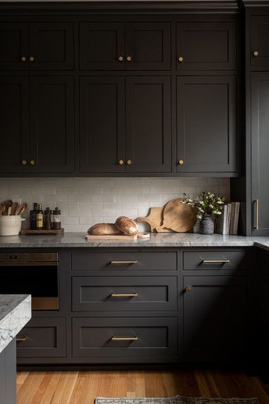 undefined Black Kitchen Base Cabinets, Painted Cabinets With Black Appliances, Black Brown Kitchen Cabinets, Dark Color Cabinets Kitchen, Cozy Moody Kitchen, Black Farmhouse Kitchen Cabinets, Dark Brown Painted Cabinets, Black Fox Cabinets, Dark Kitchen Cabinet Ideas