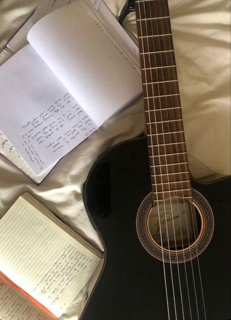 guitar, music, chords, writing, bed, aesthetic, acoustic, black, songs,  book, lyrics, songwriting, decor, Book Lyrics, Black Acoustic Guitar, Bed Aesthetic, Guitar Obsession, Wild Eyes, Music Chords, Life Vision Board, Lyrics Aesthetic, Guitar Music