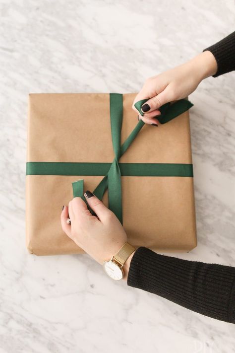 Professional Gift Wrapping Techniques, Ribbon On Presents How To Tie, Wrapping A Present, How To Tie Velvet Ribbon Bow On Present, Gift Wrapping Ribbon Ideas Bow Tutorial, Wrapping Presents With Ribbon, Ribbon On Christmas Presents, Chiffon Ribbon Gift Wrap, Tying Ribbon On Gift