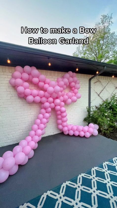 Full blog post on Simplysheppard.com Sharing how to make a balloon bow... | balloon garland | TikTok Balloon Garland Over Door, How To Make Bow Balloons, Balloon Bow Garland, Pink Bow Balloon Arch, Bow Balloon Garland, Bow Graduation Party, Door Balloon Arch, Bow Balloon Arch, Staircase Balloon Garland