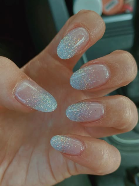 Cute January Nails Simple, Light Blue And Glitter Nails, Winter Nail Designs Glitter, Christmas And New Year Nails Simple, Nails For Light Blue Dress Prom, Light Blue Prom Nail Ideas, Light Blue Nails With Sparkle, January Nails Oval, Nail Designs Winter Simple