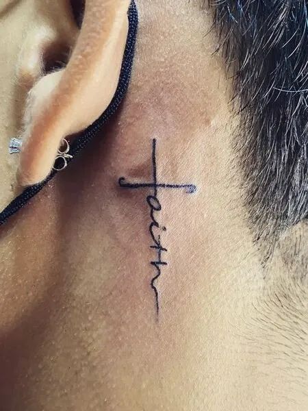 Neck Designs Tattoo Men, Ear Tattoo Ideas For Men, Behind The Ear Tattoo Ideas Strength, Cross On Neck Tattoo Men, Men Behind The Ear Tattoo Ideas, Mens Cross Neck Tattoo, Faith Ear Tattoo, Cross Tat Behind Ear, Crosses Behind Ear Tattoo