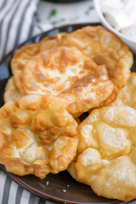 Fry Bread holds a cherished spot in American culinary traditions. It can be enjoyed in savory dishes like Navajo Tacos or sweetened with honey butter and powdered sugar. This easy-to-make bread is perfect for both savory snacks and sweet treats. Unlike typical breads, there's no need to knead the dough extensively. Indian Fry Bread is Fry Bread Recipe Easy, Indian Fry Bread Recipe Easy, Easy Fry Bread Recipe, Indian Fry Bread Recipe, Indian Fried Bread, Indian Fried Bread Recipe, Fry Bread Tacos, Fry Bread Recipe, Indian Fry Bread