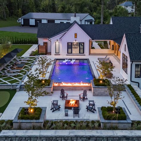 The perfect backyard to enjoy those fall evenings featuring a 20’x40’ custom Coastal pool. #custompools #farmhousedecor #realestate… | Instagram Farm Pool Backyards, Modern Pool With Tanning Ledge, Backyard Pool Patio Ideas, Modern Backyard Ideas With Pool, Pool House Landscaping, Hot Tub Separate From Pool, Pool Next To Driveway, Average Pool Size, Best Backyard Pools