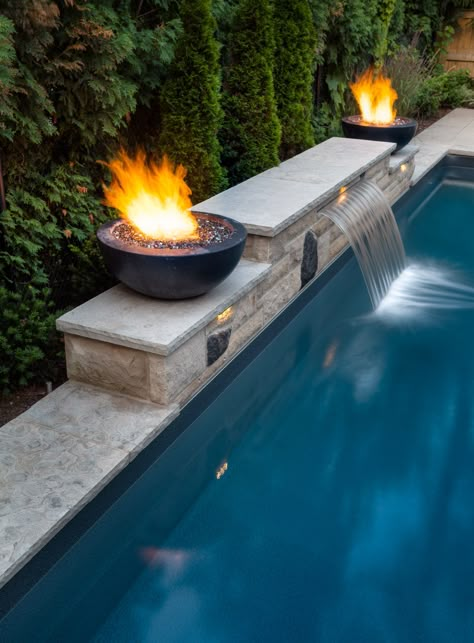 Pool Fountains Waterfall Modern, Pool Waterfall Ideas Water Walls, Pool Fire And Water Feature, Fire Water Feature Pool, Water Feature Pool Ideas, Small Pools With Waterfalls, Modern Pool Fountain, Fire And Water Pool Features, Pool Back Wall Ideas