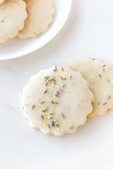 The perfect cross between a shortbread and butter cookie, these easy Lemon Lavender Cookies are ideal for Mother's Day, bridal showers, birthdays, or a much needed treat. Topped with a delicious lemon glaze, they are sure to become a favorite! #lemonlavender #lemoncookies #cookierecipes #lemonlavendercookies #lavendercookies Lemon Lavender Cookies, Blueberry Crumble Muffins, Lavender Cookies, Lavender Recipes, Citrus Recipes, Culinary Lavender, Spring Treats, Blueberry Crumble, Lemon Muffins