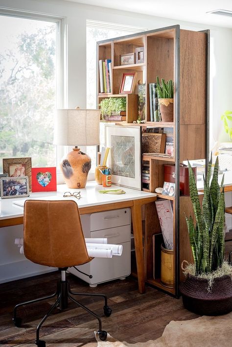 For a small home office that needs to work for two, consider creating separate spaces by utilizing two desks divided by a bookshelf turned makeshift wall. #officedecor #officeideas #officeorganization #homedecor #bhg White Wall Office Decor, Multi Desk Office, His Her Home Office, Shared Office Layout, Small Office Two Desks Layout, His Her Office, Family Office Space, His And Hers Home Office, His And Hers Office