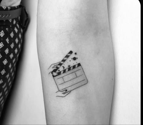 Take Action Tattoo, Cinema Tattoo Ideas Minimalist, Small Movie Tattoos, Cinema Tattoo Ideas, Movie Tattoos Minimalist, Action Tattoo, Cinema Tattoo, Nostalgia Tattoo, Writer Tattoo