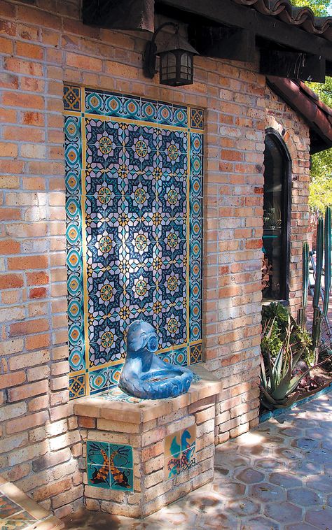 Tile and recycled yellow brick set off a lovely drinking fountain with a mythical sea creature theme Fountain Tile, Moroccan Garden, Outdoor Wall Fountains, Fountain Design, Mexican Home, Patio Wall, Outdoor Fountain, Spanish Style Homes, Hacienda Style