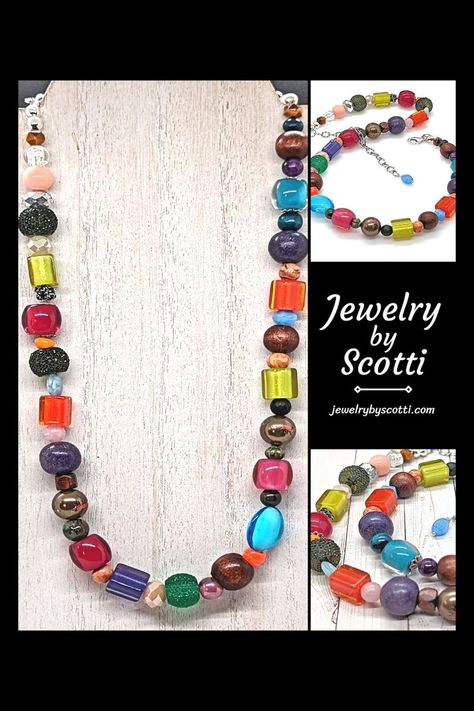 This big, bold, bodacious boho bling makes a statement – and that statement is, “Let’s party!” This fun, funky multicolor big bead necklace was created using large recycled vintage glass beads, gemstone beads, wood beads, and more. (I’m pretty sure everyone’s favorite color is in here somewhere…) An extension chain and lobster claw clasp allow you to adjust the length of this bead soup necklace from 16 to 20 inches. #jewelrybyscotti #bohobling #statementnecklace #festiveoccasions Big Bead Necklace, Bold Boho, Bead Soup, Beads Clay, Necklace Bead, Beads Chain, Gift Ideas For Everyone, Handcrafted Necklace, Glass Color